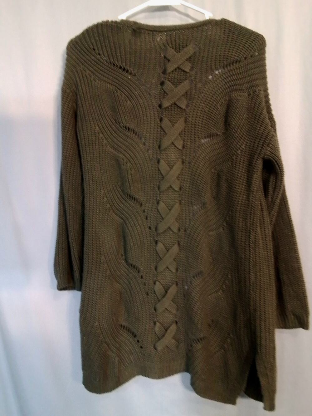 Pink Rose;  Dark  green sweater